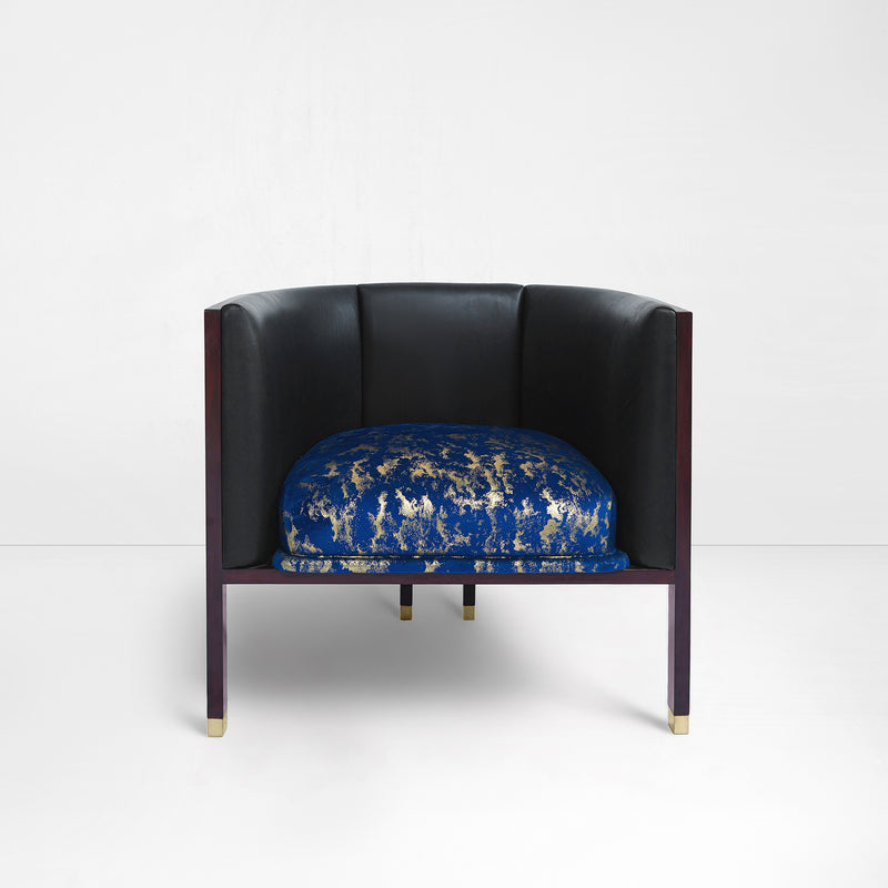 Erete single chair in blue/ gold velvet seat and black leather backrest